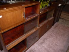 Two Minty mahogany and glazed sectional bookcases with cupboards of three and two tiers,