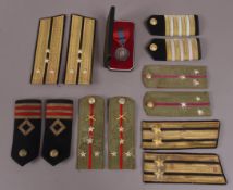 An Elizabeth II Imperial War medal together with six pairs of WWII epaulettes