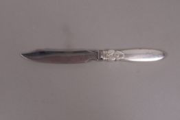 A Georg Jensen cactus pattern sterling silver and stainless steel cheese knife,
