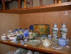 A quantity of Chinese ceramics, including ginger jars, vases, plates,