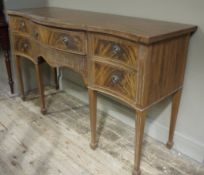 A Georgian style mahogany serpentine fronted sideboard,