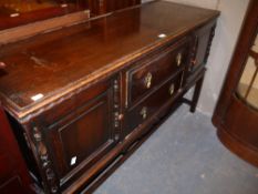 A 1920s oak sideboard with split pilaster detail