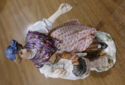 A 19th century Meissen figure of a girl selling lace on a naturalistic base underglaze blue cross