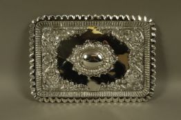 An Edward VII silver dressing table tray, rectangular, of leaf curl decoration, Sheffield 1901,