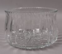 A contemporary cut glass bowl of circular outline
