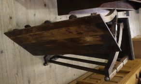 A pair of hat and coat racks together with a set of numbered pigeon holes in three tiers