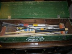 A Jaques of London croquet set and two golf clubs