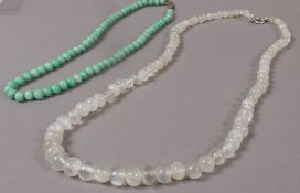 A moonstone bead necklace, the graduated oval beads fastened with a silver bolt ring,