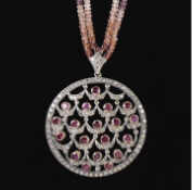 A BELLE EPOQUE UNMARKED GOLD AND SILVER AMETHYST AND DIAMOND CLUSTER