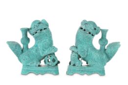 A PAIR OF CHINESE ROBIN'S EGG GLAZED LION DOG JOSS STICK HOLDERS. Qing Dynasty, 19th Century. The
