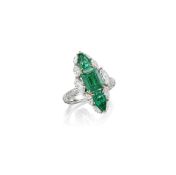 An Emerald and Diamond Ring