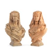A pair of late 19th century French terracotta busts of a male and female Moor by William Guerin ...