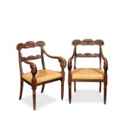 A PAIR OF ITALIAN LATE REGENCY CARVED MAHOGANY ARMCHAIRSIn the manner of Henry Thomas Peters, Ge...