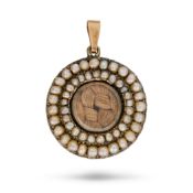 NO RESERVE - AN ANTIQUE HAIRWORK AND PEARL MOURNING LOCKET PENDANT comprising a circular glass