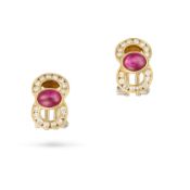 NO RESERVE - A PAIR OF RUBY AND DIAMOND EARRINGS each set with an oval cabochon ruby accented by