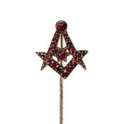 NO RESERVE - AN ANTIQUE MASONIC GARNET STICK / TIE PIN depicting a compass and set square, set