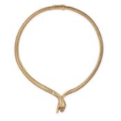 NO RESERVE - A VINTAGE RUBY SNAKE NECKLACE, 1964 in 9ct yellow gold, designed as a snake, the eyes