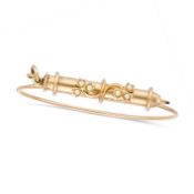 AN ANTIQUE PEARL PENCIL BANGLE, 1907 in 9ct yellow gold, the bangle comprising a cage housing a
