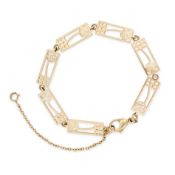 NO RESERVE - A VINTAGE GOLD BRACELET in 9ct yellow gold, comprising seven stylised openwork links,
