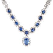NO RESERVE - A CONVERTIBLE SAPPHIRE AND DIAMOND CLUSTER PENDANT NECKLACE / BRACELET comprising a row