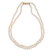 NO RESERVE - A TWO ROW PEARL AND DIAMOND NECKLACE in 18ct yellow gold, comprising two rows of pearls