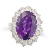 NO RESERVE - AN AMETHYST AND DIAMOND CLUSTER RING set with an oval cut amethyst of approximately 7.