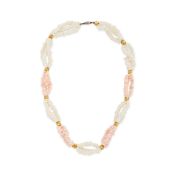 NO RESERVE - A PINK AND WHITE SHELL NECKLACE comprising three rows of pieces of white shell,