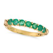 NO RESERVE - AN EMERALD HALF ETERNITY RING set with a row of round cut emeralds, stamped 750, size O